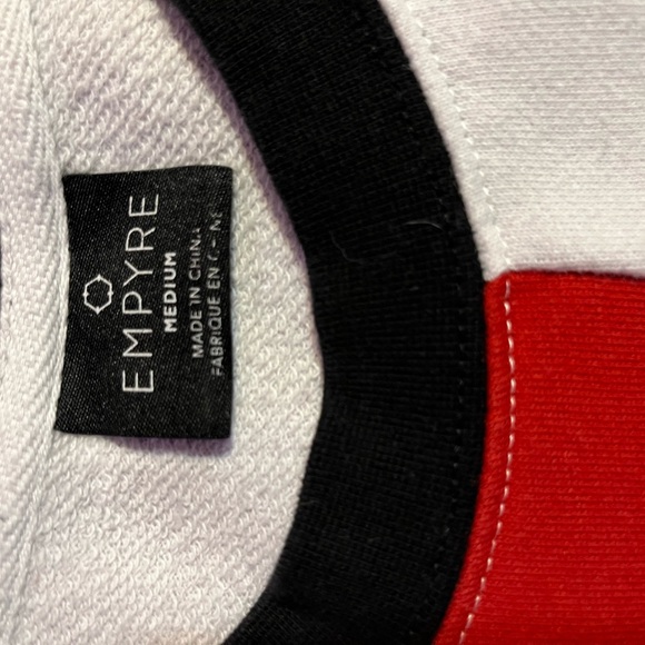 A sweater - Picture 2 of 2